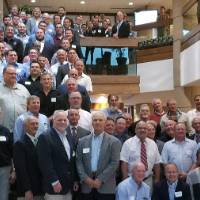 Group photo of alumni and current wrestlers at the GVSU Wrestling 50th Anniversary Celebration & Fundraiser